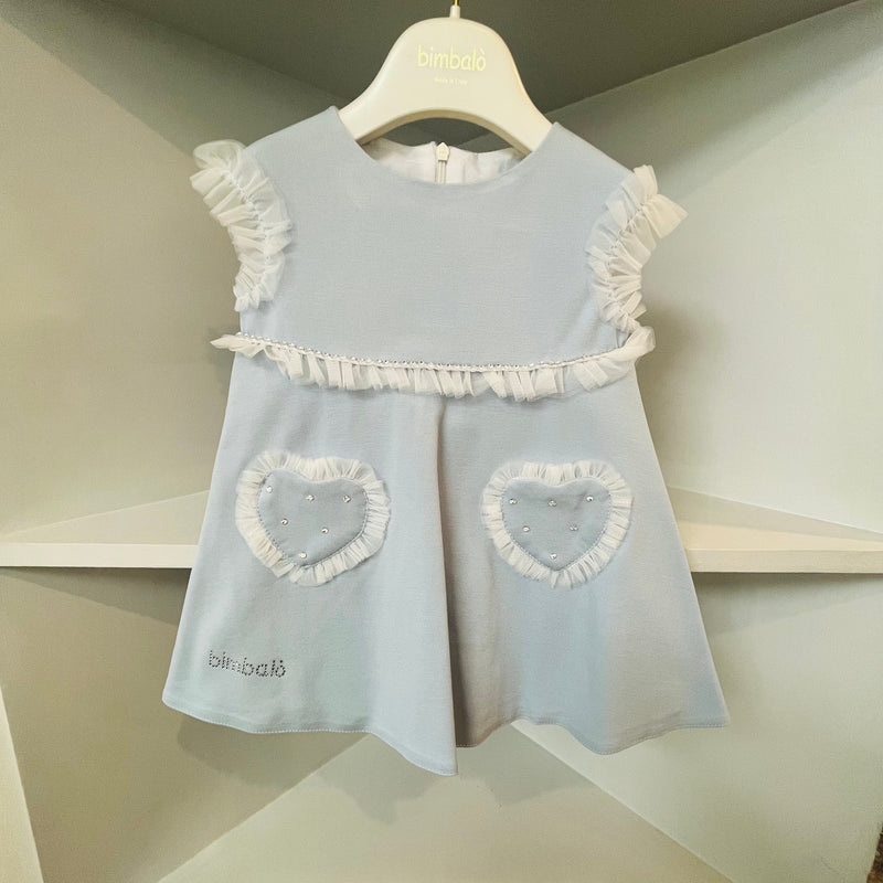 Baby in blue sales dress